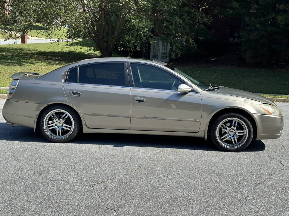 2004 Nissan Altima for sale at SHURE AUTO SALES in Snellville, GA