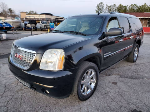 2007 GMC Yukon XL for sale at GEORGIA AUTO DEALER LLC in Buford GA