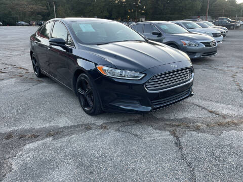 2014 Ford Fusion for sale at Certified Motors LLC in Mableton GA