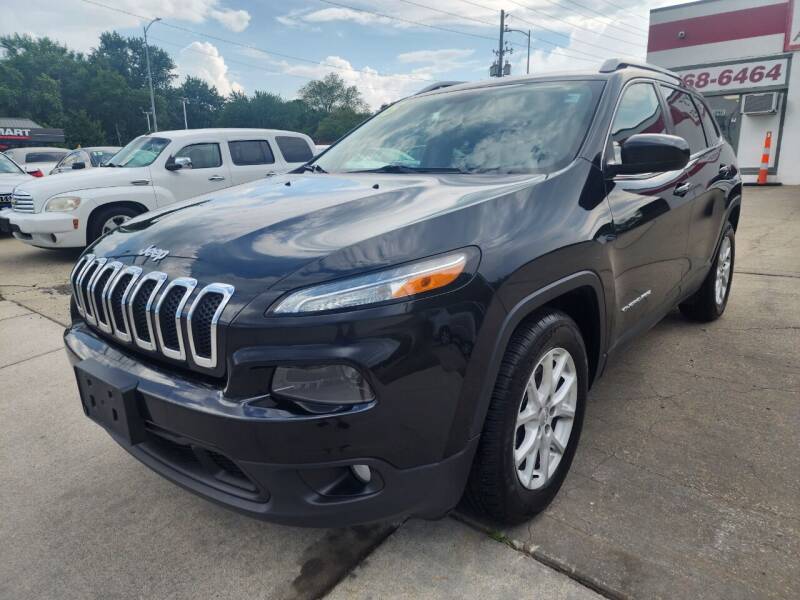 2015 Jeep Cherokee for sale at Quallys Auto Sales in Olathe KS