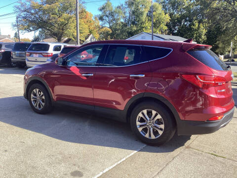 2015 Hyundai Santa Fe Sport for sale at EL AMIGO AUTO SALES in Des Moines IA