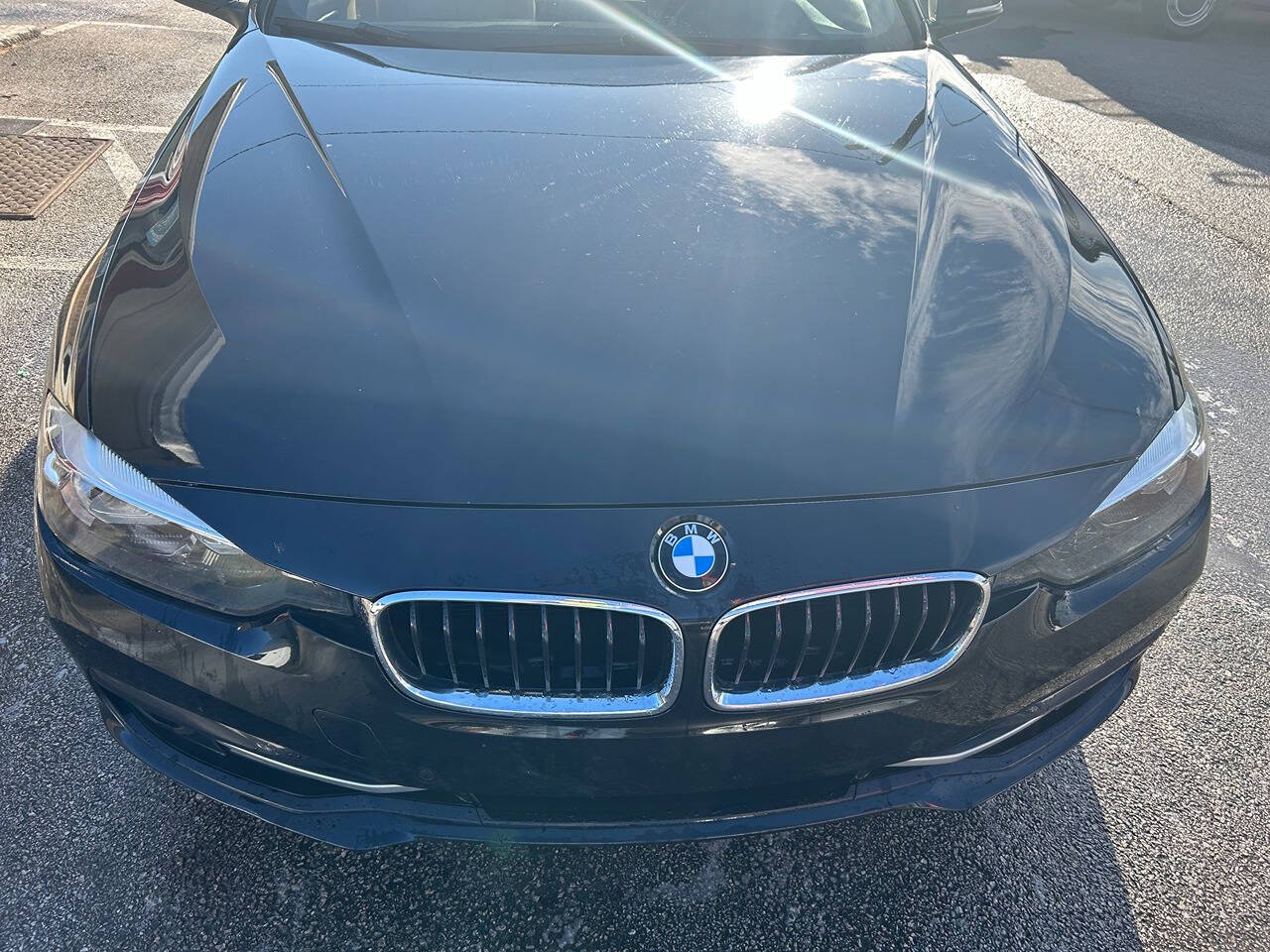 2016 BMW 3 Series for sale at Justin Hughes Auto Group LLC in Douglasville, GA