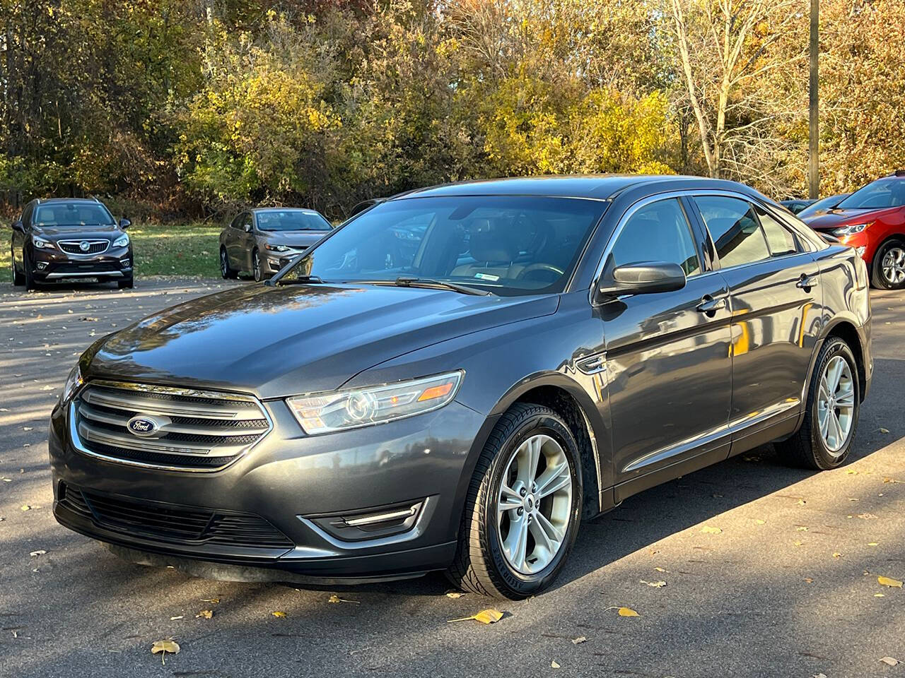 2015 Ford Taurus for sale at Spartan Elite Auto Group LLC in Lansing, MI