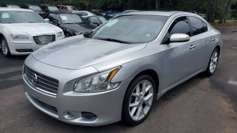 2009 Nissan Maxima for sale at GEORGIA AUTO DEALER LLC in Buford GA