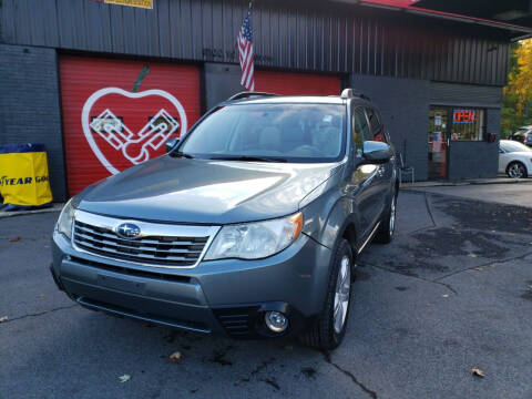 2010 Subaru Forester for sale at Apple Auto Sales Inc in Camillus NY