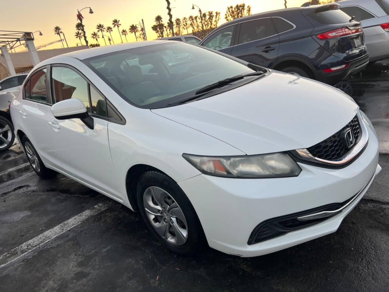 2015 Honda Civic for sale at Unique Auto Sales, Inc. in Bell, CA