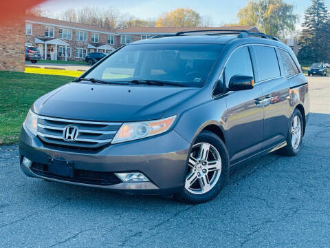 2012 Honda Odyssey for sale at Olympia Motor Car Company in Troy NY