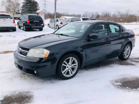 2011 Dodge Avenger for sale at Al's Used Cars in Cedar Springs MI