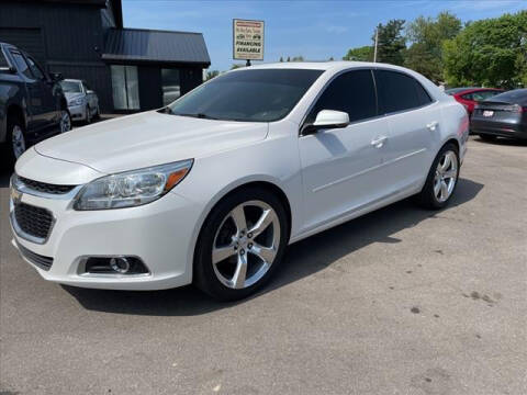 2015 Chevrolet Malibu for sale at HUFF AUTO GROUP in Jackson MI