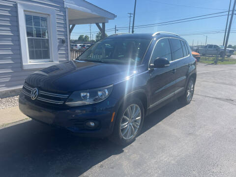 2012 Volkswagen Tiguan for sale at HEDGES USED CARS in Carleton MI