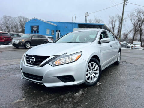 2017 Nissan Altima for sale at MGM Auto Group in Framingham MA