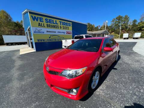 2014 Toyota Camry for sale at Livingston Auto Traders LLC in Livingston TN