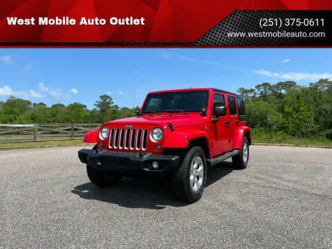 2016 Jeep Wrangler Unlimited for sale at West Mobile Auto Outlet in Mobile AL