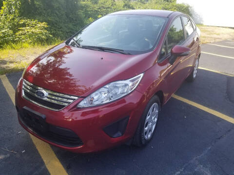 2013 Ford Fiesta for sale at Howe's Auto Sales in Lowell MA