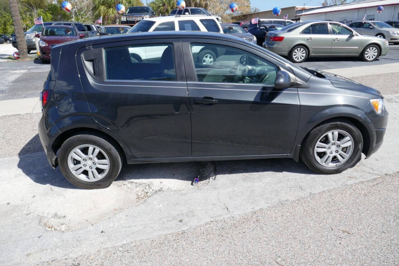 Preowned 2014 Chevrolet Sonic LT Auto 4dr Hatchback for sale by Crazy Cheap Cars in Oakfield, NY