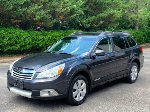 2011 Subaru Outback for sale at Triangle Motors Inc in Raleigh NC