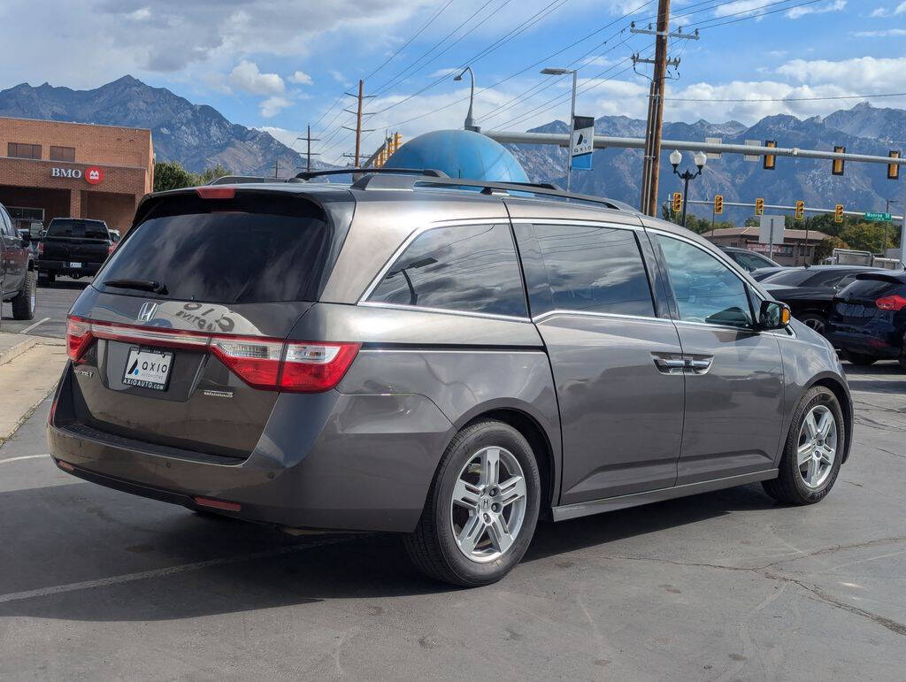 2013 Honda Odyssey for sale at Axio Auto Boise in Boise, ID