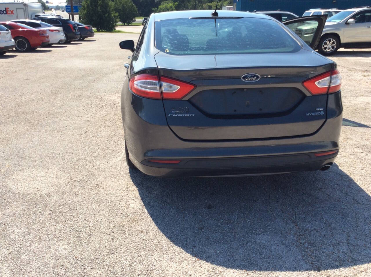 2016 Ford Fusion Hybrid for sale at SPRINGTIME MOTORS in Huntsville, TX