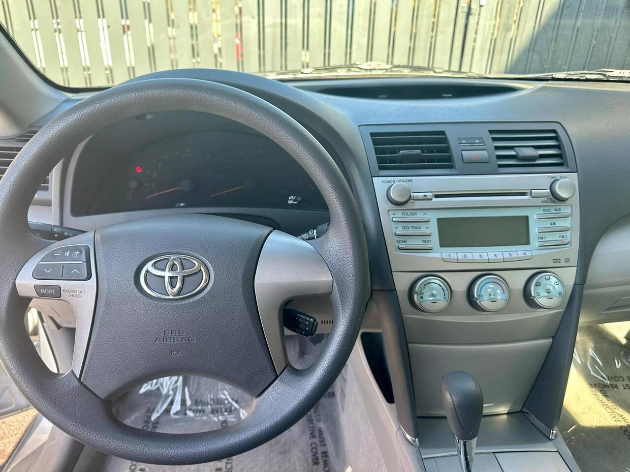 2007 Toyota Camry for sale at HUDSONS AUTOS in Gilbert, AZ