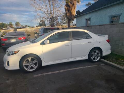 2013 Toyota Corolla for sale at E and M Auto Sales in Bloomington CA