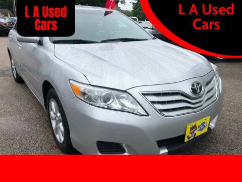 2011 Toyota Camry for sale at L A Used Cars in Abington MA
