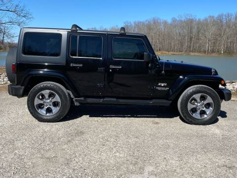 2016 Jeep Wrangler Unlimited for sale at Monroe Auto's, LLC in Parsons TN