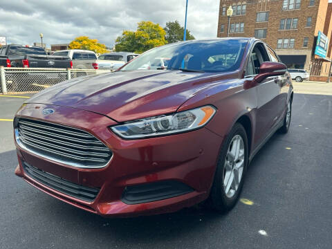 2014 Ford Fusion for sale at H C Motors in Royal Oak MI