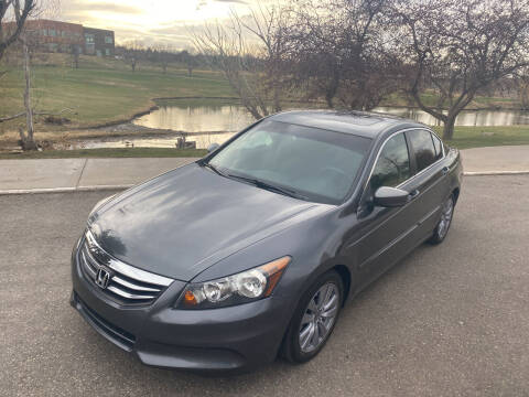 2011 Honda Accord for sale at QUEST MOTORS in Englewood CO