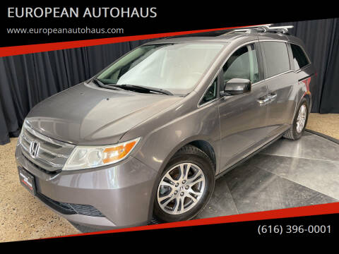 2011 Honda Odyssey for sale at EUROPEAN AUTOHAUS in Holland MI