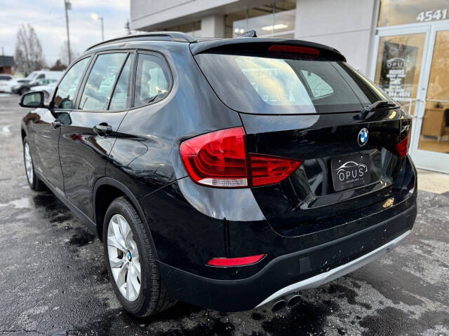 2013 BMW X1 for sale at Opus Motorcars in Utica, MI