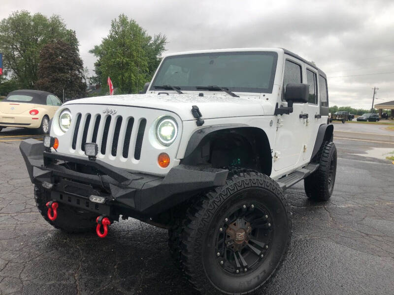 2011 Jeep Wrangler Unlimited for sale at Icon Auto Group in Lake Odessa MI