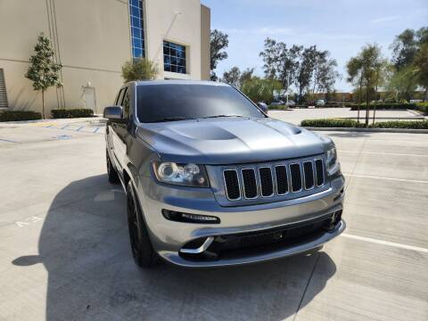 2013 Jeep Grand Cherokee for sale at E and M Auto Sales in Bloomington CA