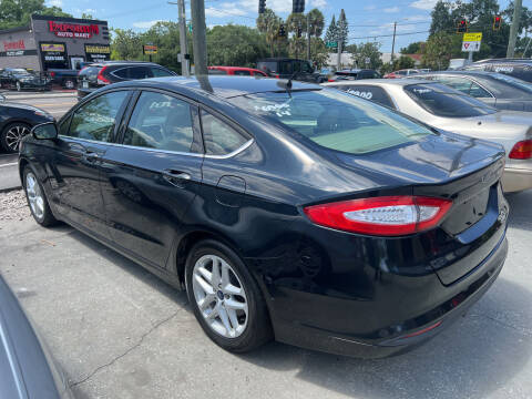 2014 Ford Fusion for sale at Bay Auto Wholesale INC in Tampa FL