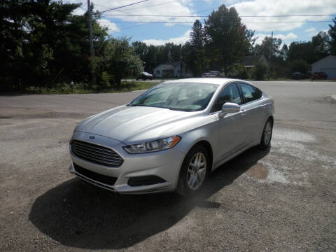 2014 Ford Fusion for sale at G T SALES in Marquette MI