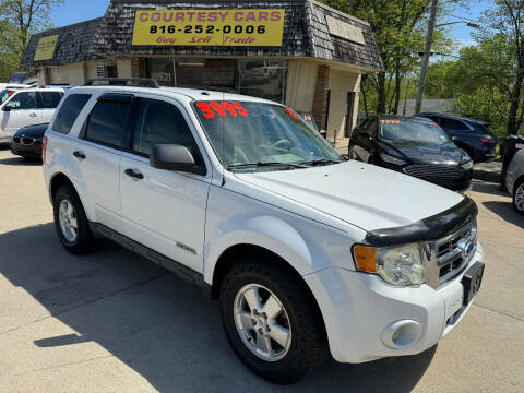 2011 Ford Escape for sale at Courtesy Cars in Independence MO