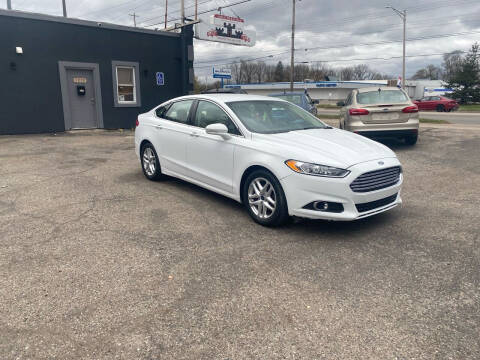 2016 Ford Fusion for sale at Castle Cars Inc. in Lansing MI