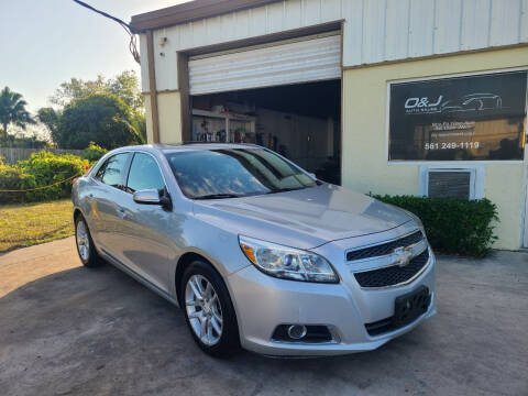 2013 Chevrolet Malibu for sale at O & J Auto Sales in Royal Palm Beach FL