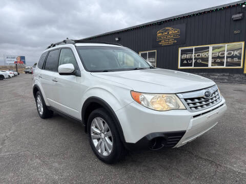 2012 Subaru Forester for sale at BELOW BOOK AUTO SALES in Idaho Falls ID