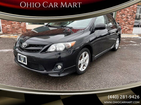 2013 Toyota Corolla for sale at Ohio Car Mart in Elyria OH