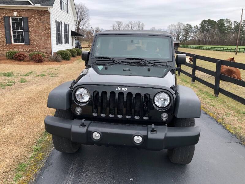 2015 Jeep Wrangler Unlimited for sale at Performance Auto Center Inc in Benson NC