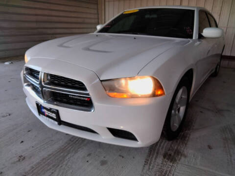 2014 Dodge Charger for sale at LA PULGA DE AUTOS in Dallas TX