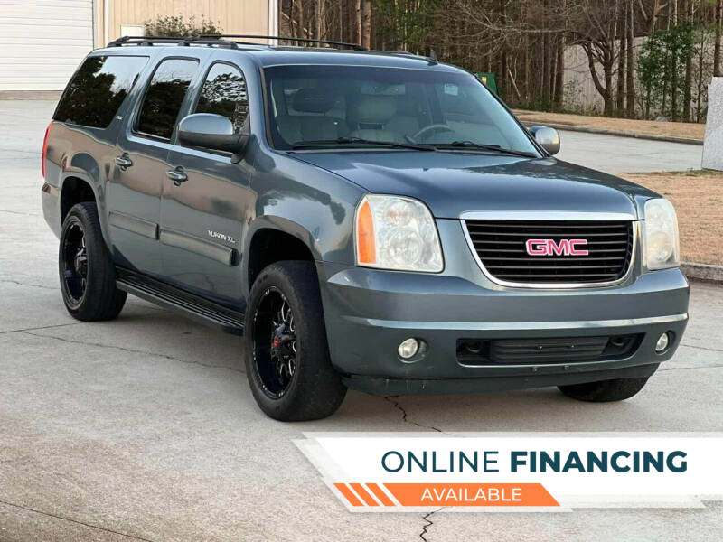 2010 GMC Yukon XL for sale at Two Brothers Auto Sales in Loganville GA