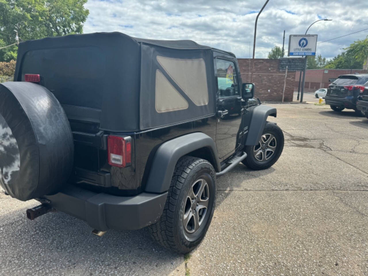 2011 Jeep Wrangler for sale at First Class Auto Mall in Akron, OH