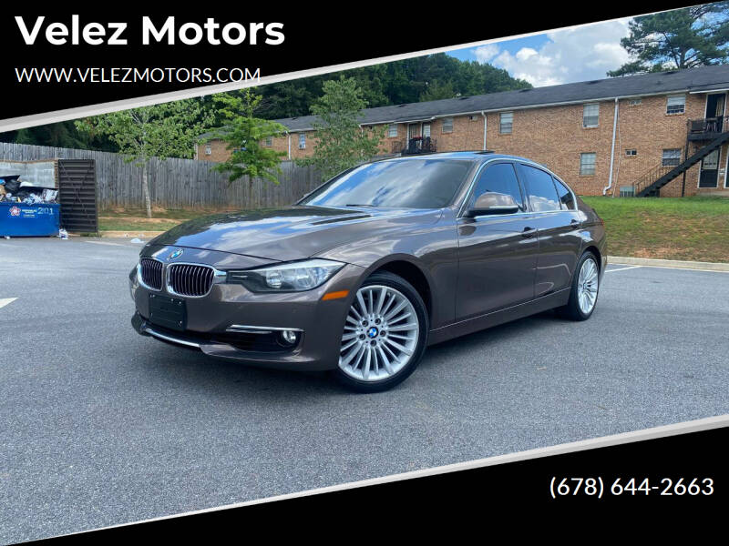 2013 BMW 3 Series for sale at Velez Motors in Peachtree Corners GA