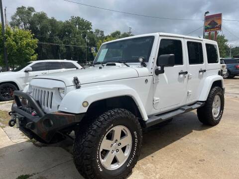 2013 Jeep Wrangler Unlimited for sale at Azteca Auto Sales LLC in Des Moines IA