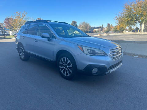 2015 Subaru Outback for sale at The Car-Mart in Bountiful UT