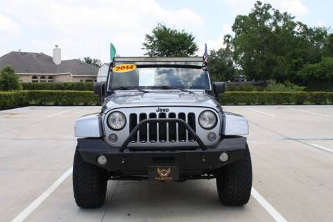 2014 Jeep Wrangler Unlimited for sale at Fabela's Auto Sales Inc. in Dickinson TX
