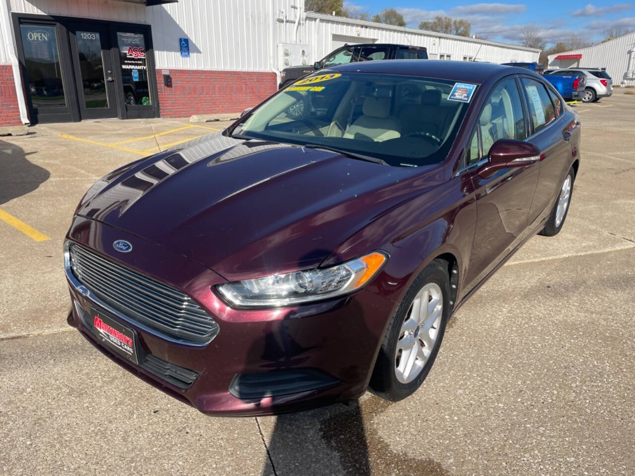 2013 Ford Fusion for sale at Martinson's Used Cars in Altoona, IA