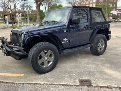 2013 Jeep Wrangler for sale at Classic Car Deals in Cadillac MI