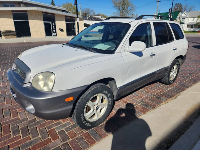 2003 Hyundai Santa Fe for sale at Haraldson Auto Mart in La Porte City IA